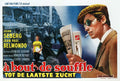 Vintage French poster art for À bout de souffle (Breathless) featuring a close-up of Jean-Paul Belmondo smoking and Jean Seberg in the background.