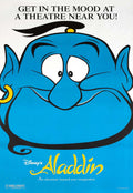 Classic theatrical poster for Disney's Aladdin showing a bright blue close-up of the Genie with large white eyes and the text 'Get in the mood'.