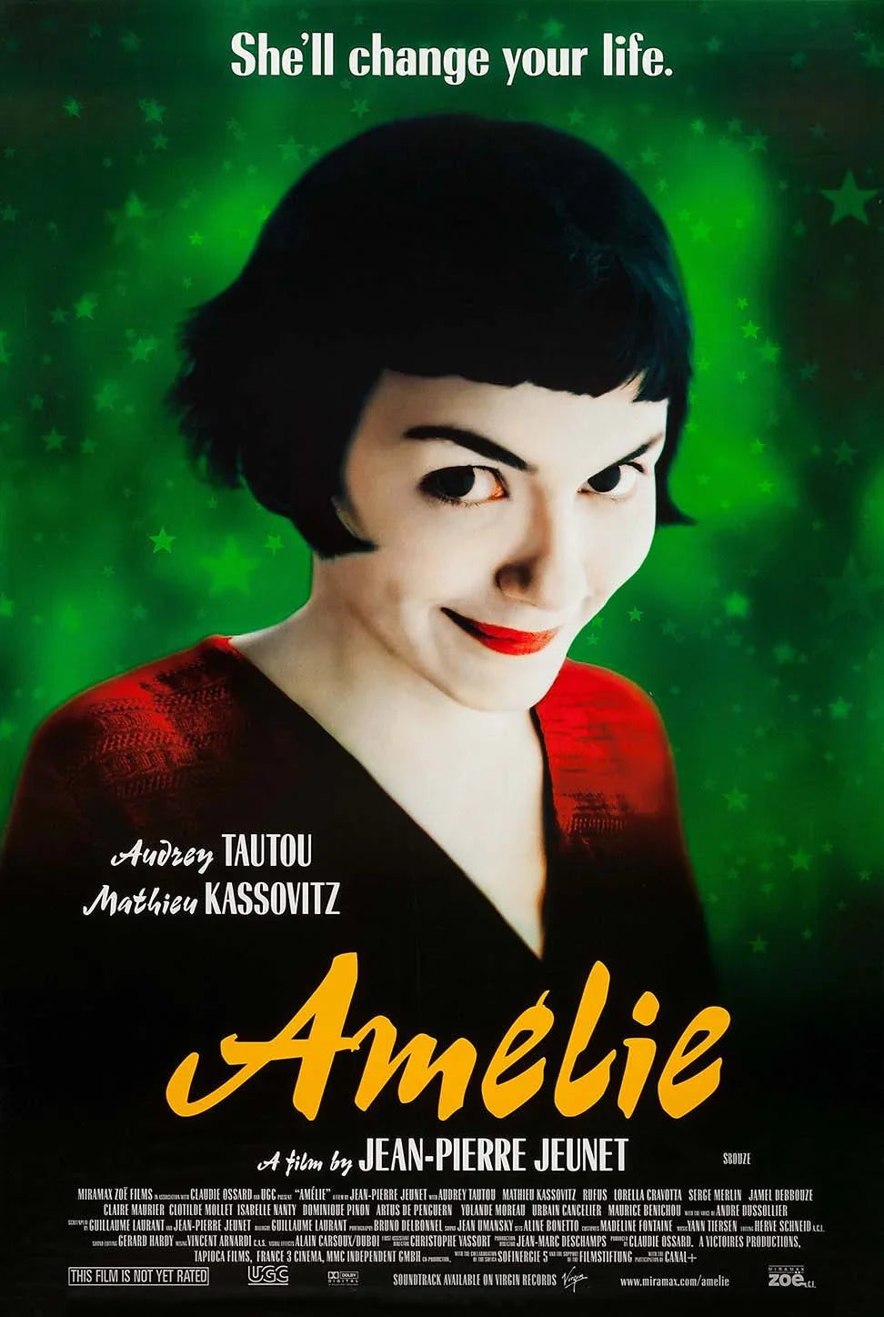 Close-up portrait of Amélie Poulain (Audrey Tautou) from the 2001 film, featuring her iconic red lipstick and black bob cut against a star-filled green background.