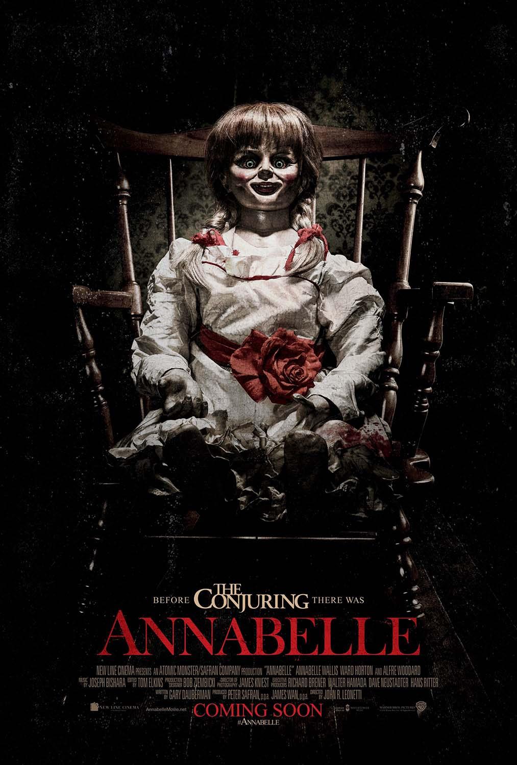 Official Annabelle movie poster featuring the haunting porcelain doll seated in a rocking chair, illuminated against a dark, ominous backdrop.