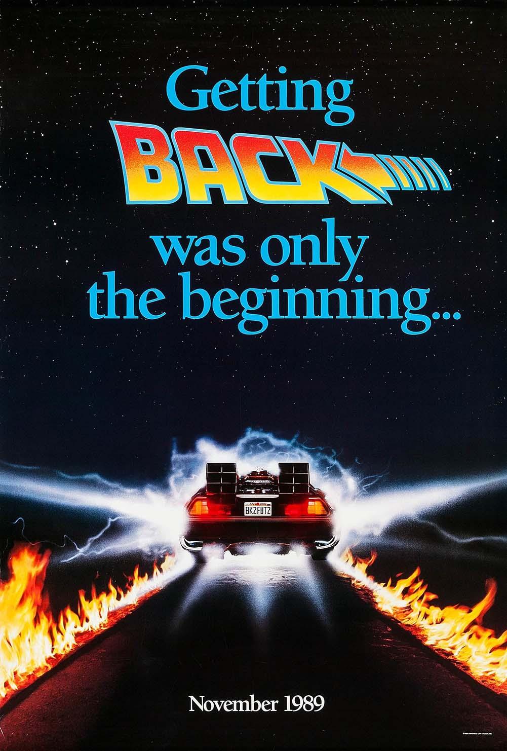 Original theatrical poster for Back to the Future Part II, showing the DeLorean time machine speeding away and leaving trails of fire on the asphalt under a starry sky.