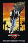Eddie Murphy as Axel Foley in the original Beverly Hills Cop II movie poster, leaning by the Beverly Hills sign during a dramatic orange sunset.