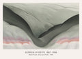 Reproduction of Georgia O'Keeffe's 1949 oil painting, showing smooth, abstract landscape forms in varying shades of grey and blush pink at the bottom edge.
