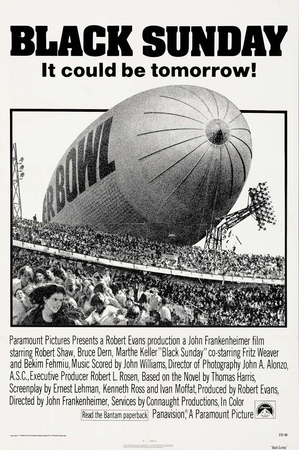 Original Black Sunday movie poster featuring a colossal, dark blimp looming dramatically over a large, panicked crowd in a Super Bowl stadium.