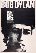 Iconic 1967 documentary poster featuring a grainy, black and white close-up portrait of Bob Dylan smoking a cigarette, titled 'Don't Look Back'.