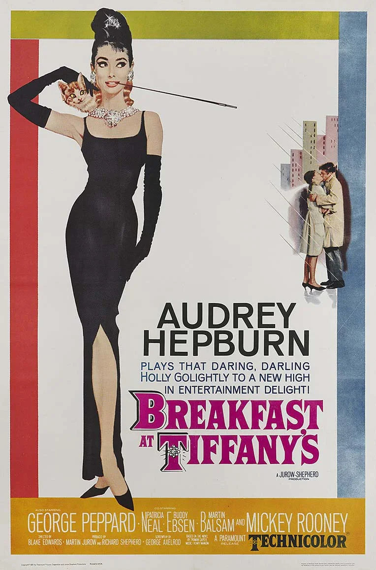 Original 1961 movie poster for Breakfast at Tiffany's featuring Audrey Hepburn as Holly Golightly in a black dress with a cigarette holder.