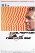Original Cool Hand Luke movie poster art featuring a dramatic close-up of Paul Newman on a bold red and yellow striped background.