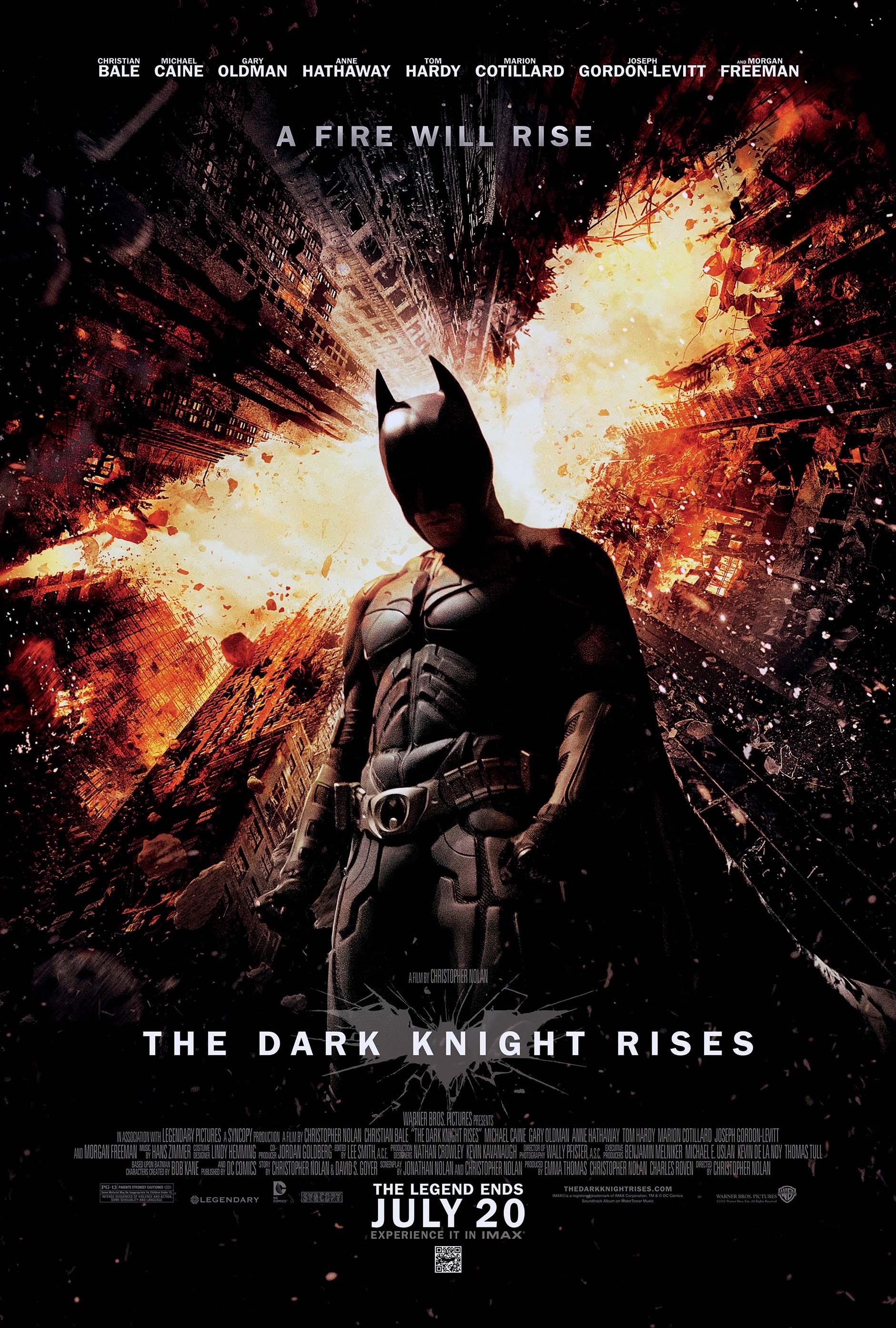 Official Dark Knight Rises movie poster showing Batman standing centered while Gotham City collapses and explodes behind him in fiery orange light.