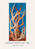 Georgia O'Keeffe's "Deer Horns" painting featuring stacked white and orange antlers over a skull against a bright blue background.