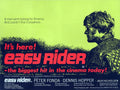 Original British Easy Rider 1969 movie poster showing a profile silhouette of Peter Fonda against a neon lime green background with bold red and blue typography.