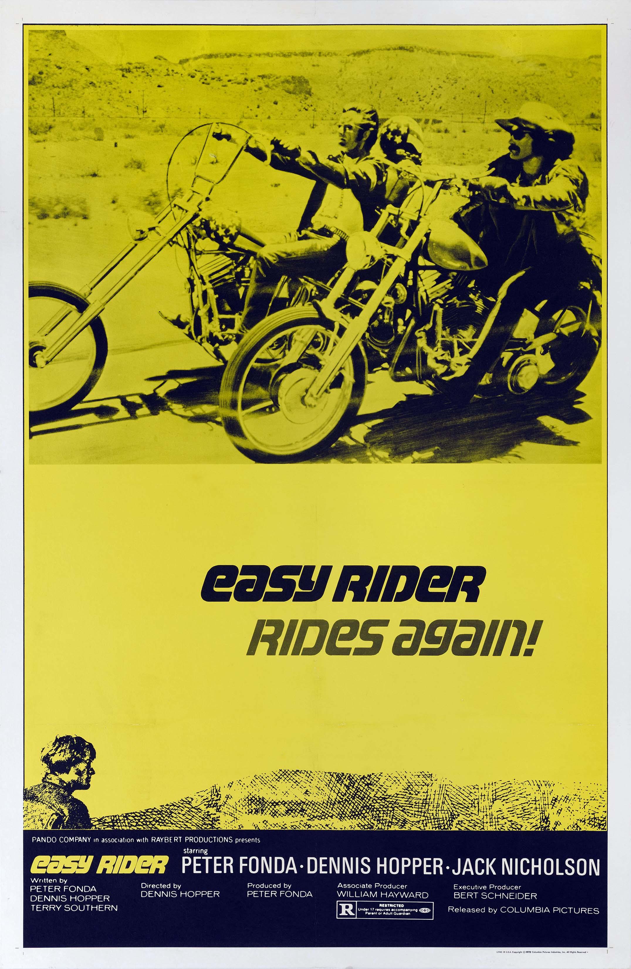 High-contrast Easy Rider movie poster showing three figures riding classic choppers against a bright yellow desert background.