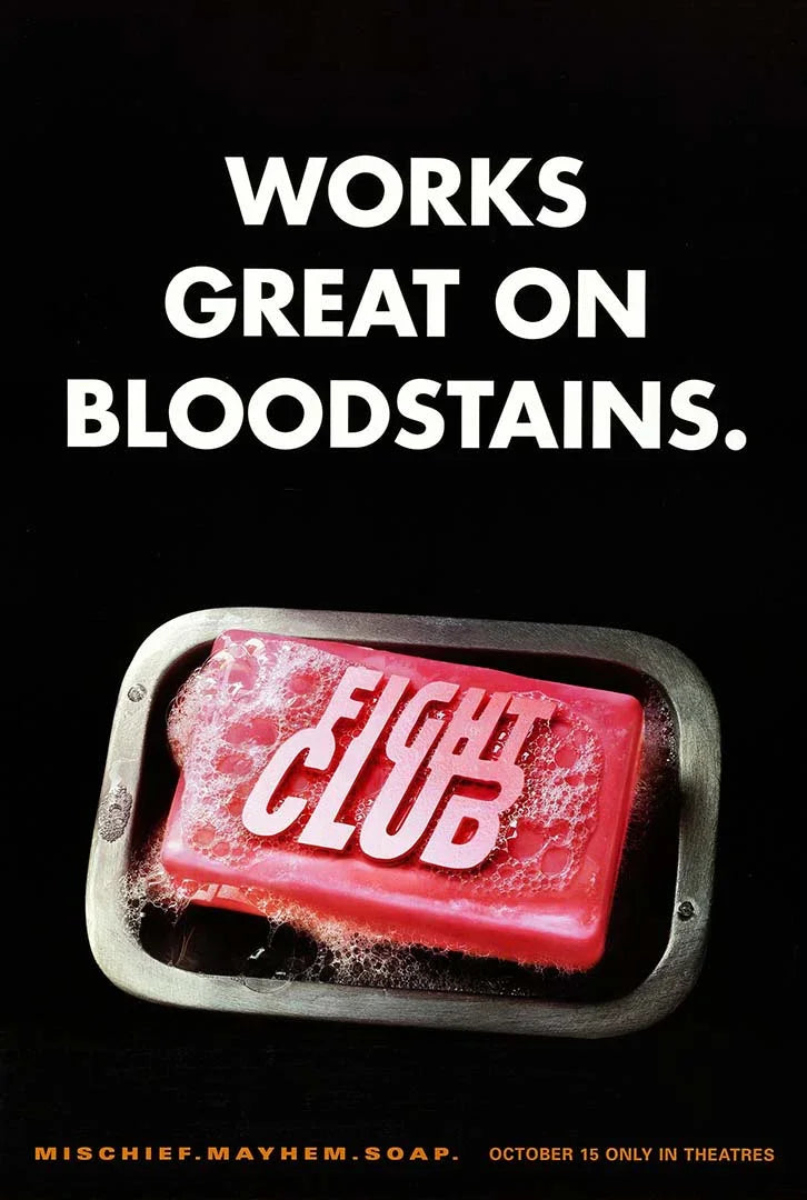 Iconic Fight Club promotional poster showing a pink bar of soap in a metal dish with the title embossed on it, set against a solid black background.