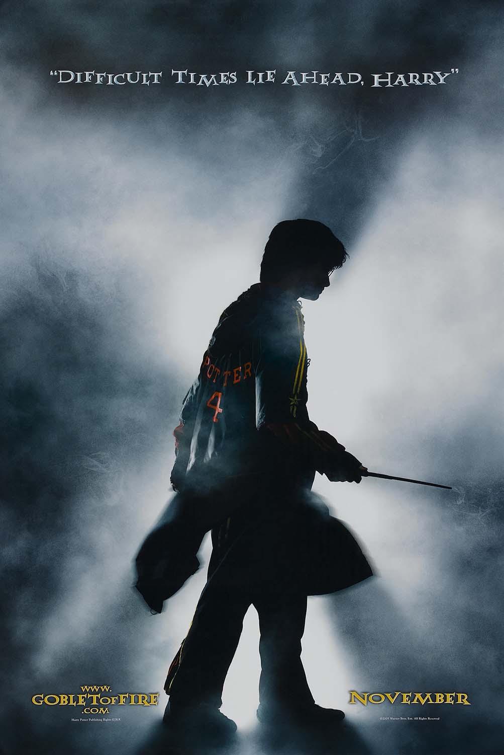 Dark, dramatic poster for Harry Potter and the Goblet of Fire showing Harry's silhouette holding his wand against foggy light.