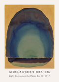 Reproduction of Georgia O'Keeffe's 1917 watercolor, "Light Coming on the Plains No. III," showing an abstract blue and indigo sunrise effect over a dark horizon on tan paper.