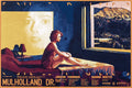 Mulholland Dr. movie art showing a woman sitting on a bed looking out a window at the Hollywood Hills with a large face projection on the wall