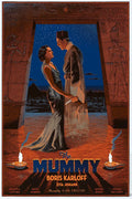 Vintage movie poster for The Mummy featuring woman in black dress holding dagger and mummy figure at ancient Egyptian temple