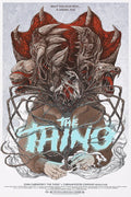 Illustration of a humanoid figure with multiple grotesque dog-like heads emerging, surrounded by eerie tendrils, with text 'The Thing'