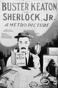 Vintage black and white poster for the film Sherlock Jr. showing Buster Keaton as a detective reading a manual, surrounded by props like a gun and handcuffs.