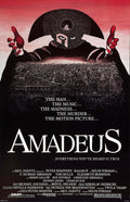 Original Amadeus 1984 movie poster showing a cloaked figure (Salieri) towering over Vienna with Mozart's image embedded in the hood.