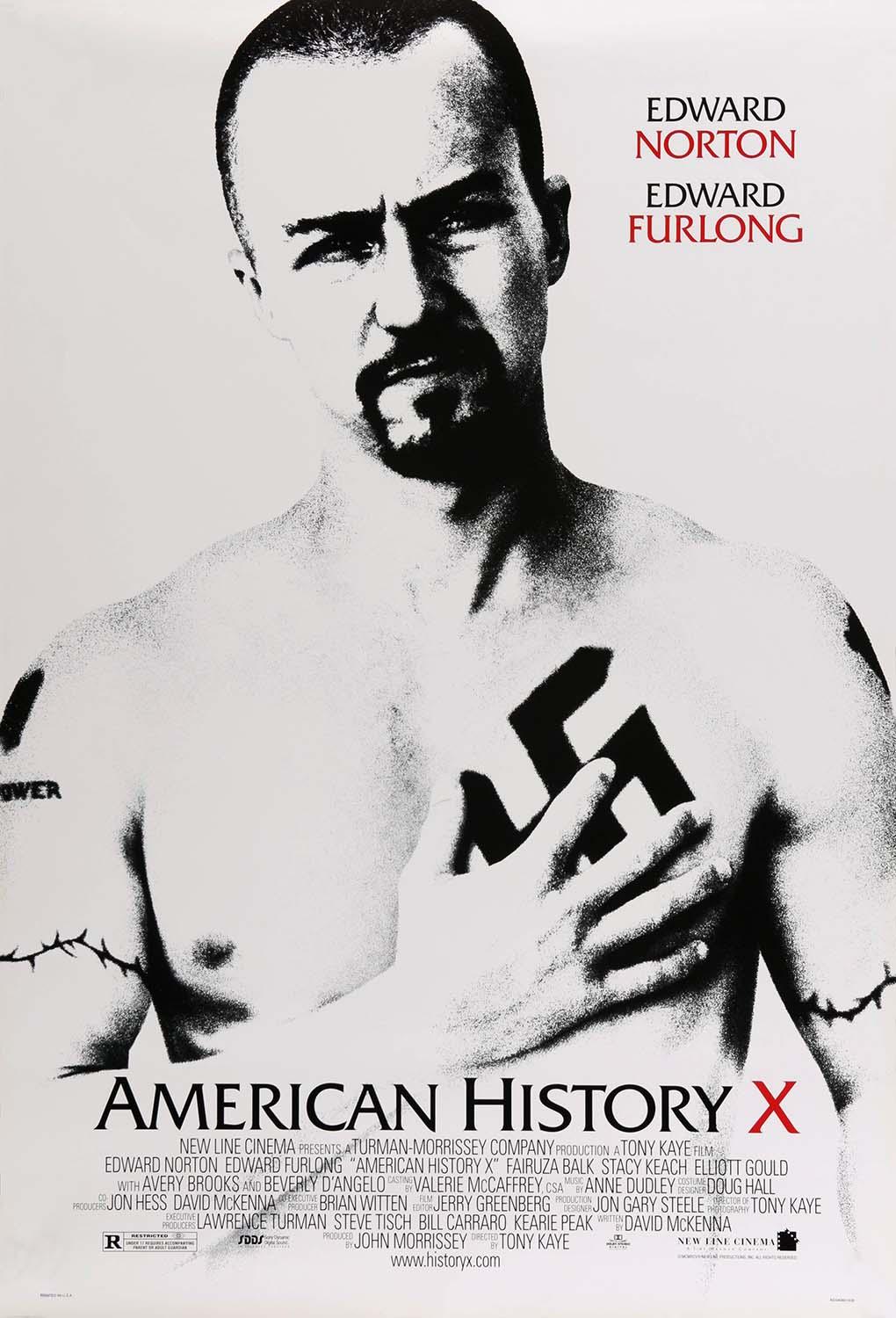 Black and white movie poster for American History X showing Edward Norton as Derek Vinyard covering his chest tattoo.