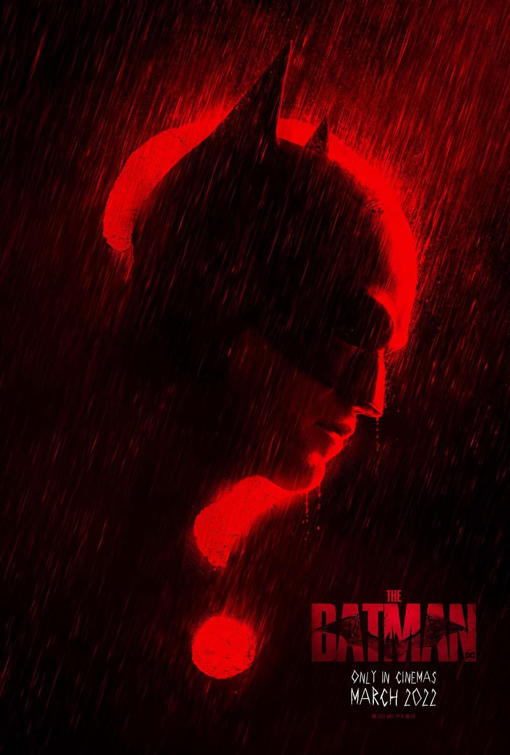 Official promotional poster for The Batman (2022) featuring the dark silhouette of the cowl outlined in a stark red question mark dripping with rain.