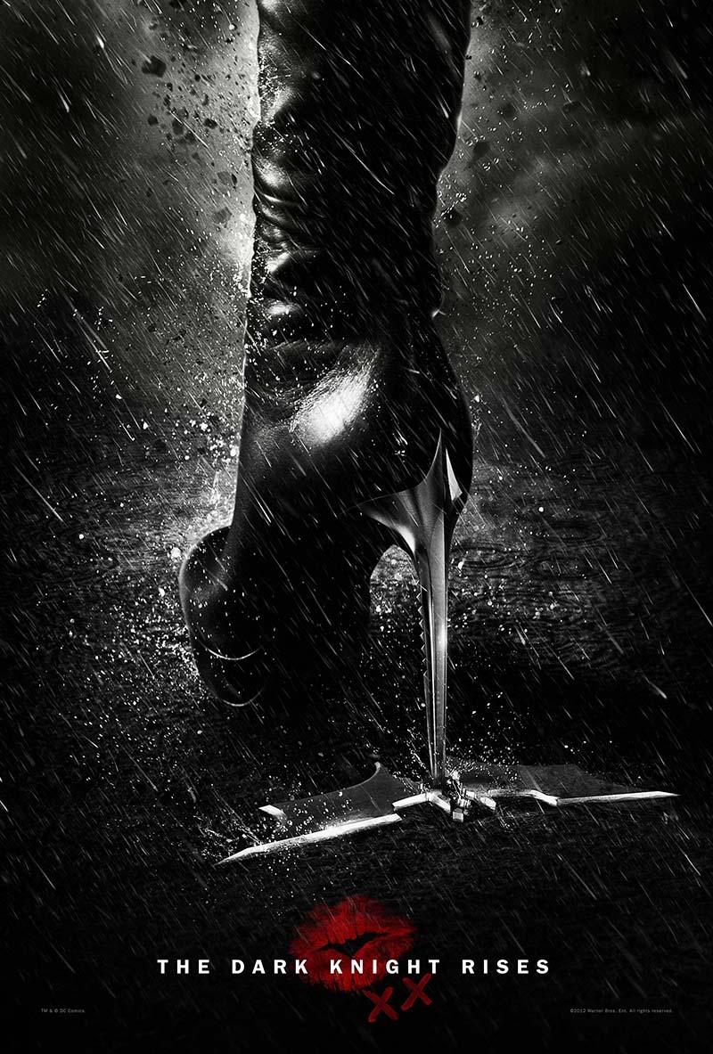 Dark Knight Rises movie poster showing a black leather boot (Catwoman) crushing a Batarang in the rain, featuring dramatic black and white lighting.