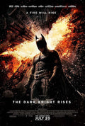Official poster for The Dark Knight Rises showing Batman standing in the foreground as Gotham City explodes in flames behind him.