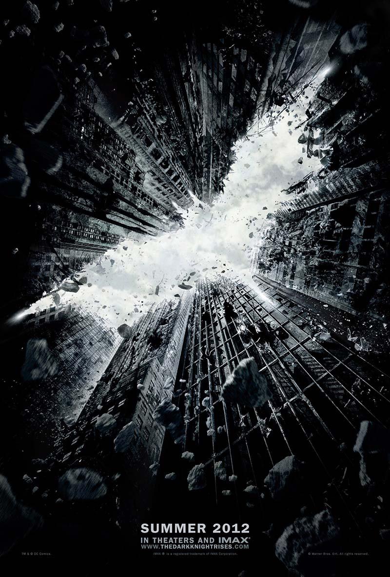 Official Dark Knight Rises movie poster showing the Gotham skyline crumbling and falling away to form the distinct Batman logo silhouette in stark black and white.