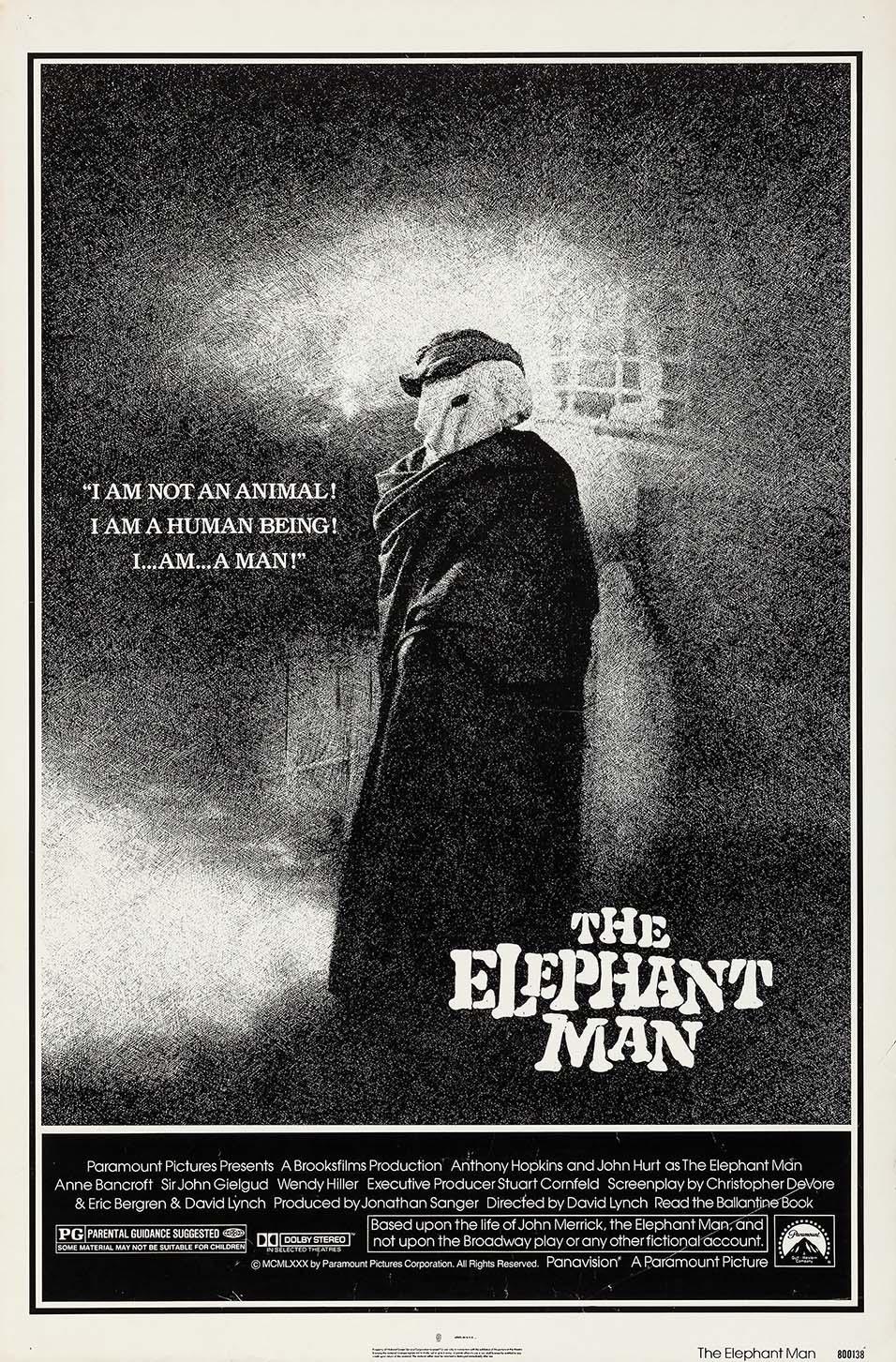 Black and white poster for The Elephant Man featuring John Hurt as Joseph Merrick, shrouded in a dark coat, standing against a textured background, with the quote "I AM NOT AN ANIMAL!".
